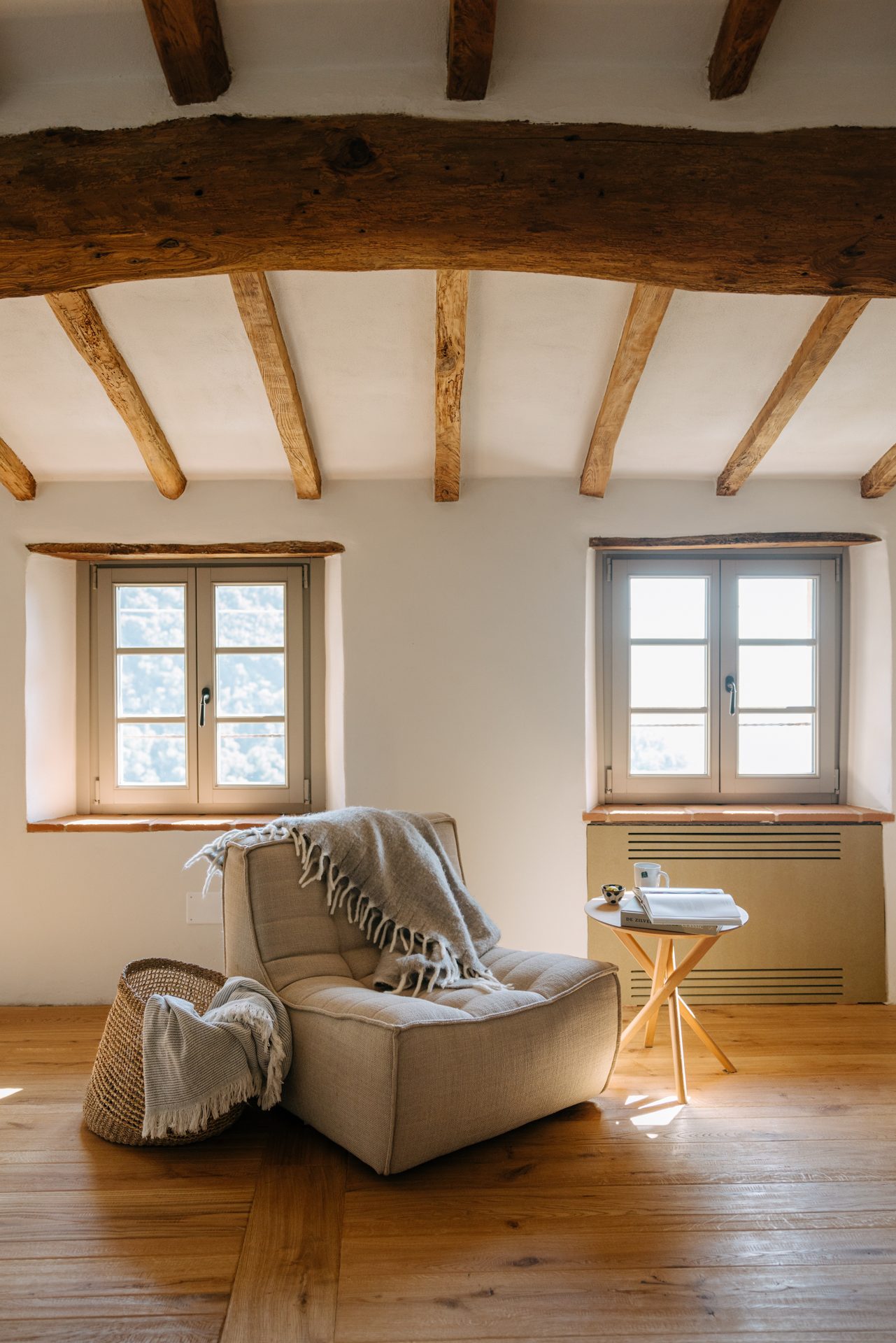 Reading room with original timber beams and wooden floors